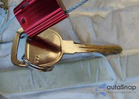 1999 Saturn Sc1 z USA, uszkodzony, nr VIN 1G8ZP1289XZ366065